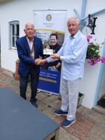 The Rotary Club of Uckfield has given The Luxford Centre £1000 towards their fundraising target of £65 000 to build an extension. Pictured is President Charles House handing a cheque over to Horst Worz; the Trustee in charge of fundraising.